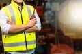 Factory engineering manager asian man Working and holding radio walkie talkie at Metal lathe industrial manufacturing factory. Royalty Free Stock Photo