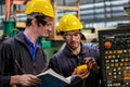 Factory engineers inspect the factory production service team