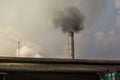 Factory flue emit smoke, pollution, industry that negatively affects the environment