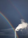 Factory fumes and rainbow Royalty Free Stock Photo