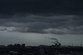 Factory funnels with thick smoke with in lowkey cloudy day Royalty Free Stock Photo