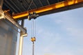 Factory girder crane installed under the canopy of the material warehouse