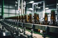 Factory for the production of beer. Brewery conveyor with glass beer drink alcohol bottles, modern production line. Blurred Royalty Free Stock Photo