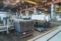 Factory for production of industrial equipment and machinery. Machine tools for working with iron and stack of metal Royalty Free Stock Photo