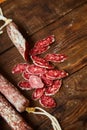 Factory for the production of meat products, boiled and smoked sausages. Traditional spicy sausage, ready to eat, lies sliced on a Royalty Free Stock Photo