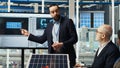 Factory research and development team analyzes solar cell prototypes Royalty Free Stock Photo