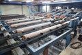 A factory for sawing logs into boards.Timber products warehouse on a specialized site