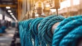 In a factory setting, a machine making nylon ropes close up Royalty Free Stock Photo
