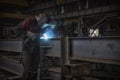 Factory welder doing his job