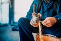 Factory industrial worker cutting iron and metal using grinder and generating sparks on construction site Royalty Free Stock Photo