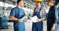 Factory worker discussing data with supervisor in metal factory Royalty Free Stock Photo