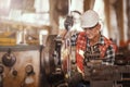 Engineer doing work with  metal lathe machine carving Royalty Free Stock Photo