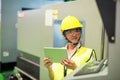 Factory worker look at machine monitor screen Royalty Free Stock Photo