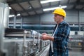 Factory worker monitoring production line Royalty Free Stock Photo
