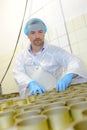 factory worker organising pots