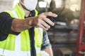 The factory worker pointing a radio communication Royalty Free Stock Photo