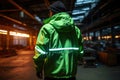 Factory worker in a reflective work jacket. Generative AI