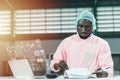 Factory worker working with advanced technology computer device with hologram mornitor display show AI business report data