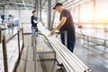 factory workers engineer checks the quality of polypropylene pipes