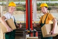 Factory workers showing thumbs up sign Royalty Free Stock Photo