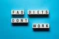 Fad diets dont work word concept on cubes Royalty Free Stock Photo