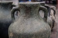 Faded antique vases closeup view for background