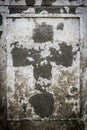 Faded cross on an old parget wall Royalty Free Stock Photo
