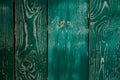 Faded dark green old wooden planking background with cracks Royalty Free Stock Photo