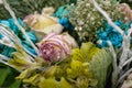 Faded flowers close up. Bouquet of pink roses and turquoise chrysanthemums Royalty Free Stock Photo