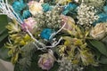 Faded flowers close up. Bouquet of pink roses and turquoise chrysanthemums Royalty Free Stock Photo