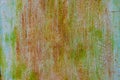 faded green paint on surface of flat sheet steel with stains of rust - full-frame background and texture Royalty Free Stock Photo