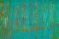 faded green paint on surface of flat sheet steel with stains of rust - full-frame background and texture Royalty Free Stock Photo