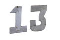 Faded grey number thirteen painted wooden sign
