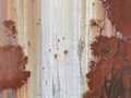 Faded old worn painted rusted sheet metal siding steal wall