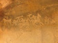Faded petroglyph, depicting men on horses and brandishing weapons, Bhimbetka rock shelter, Madhya Pradesh, India