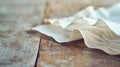 A faded plain sheet of paper sitting on a wooden table seemingly unremarkable at first glance. Yet upon closer