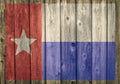 Faded Texas state flag on weathered barn wall Royalty Free Stock Photo