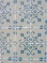 Faded vintage tiles with floral ornate in authentic Portuguese tradition in Lisbon, Portugal