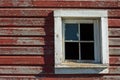 Barn window with broken glass Royalty Free Stock Photo