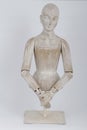 Faded white poseable decorative model human figure Royalty Free Stock Photo