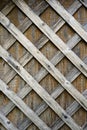 Faded wooden slats nailed to wooden plywood