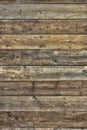 Faded worn dark pine wood background vertical