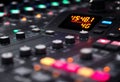 Professional Audio Mixer Control Surface with Illuminated Faders and Digital Display Royalty Free Stock Photo