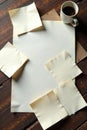 Fading white paper notes scattered on a wooden table , forgotten, papers Royalty Free Stock Photo