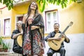 Fado band performing traditional portuguese music in the courtyard in Lisbon, Portugal Royalty Free Stock Photo