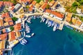 FAerial drone view of Fiscardo village port with luxury boats and yachts on Kefalonia island, Greece Royalty Free Stock Photo