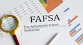 FAFSA inscription on the documents. Business concept