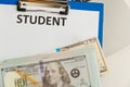 Fafsa. Student aid concept. Application form of document on the table with money. Royalty Free Stock Photo