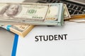 Fafsa. Student aid concept. Application form of document on the table with money. Royalty Free Stock Photo