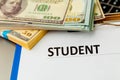 Fafsa. Student aid concept. Application form of document on the table with money. Royalty Free Stock Photo